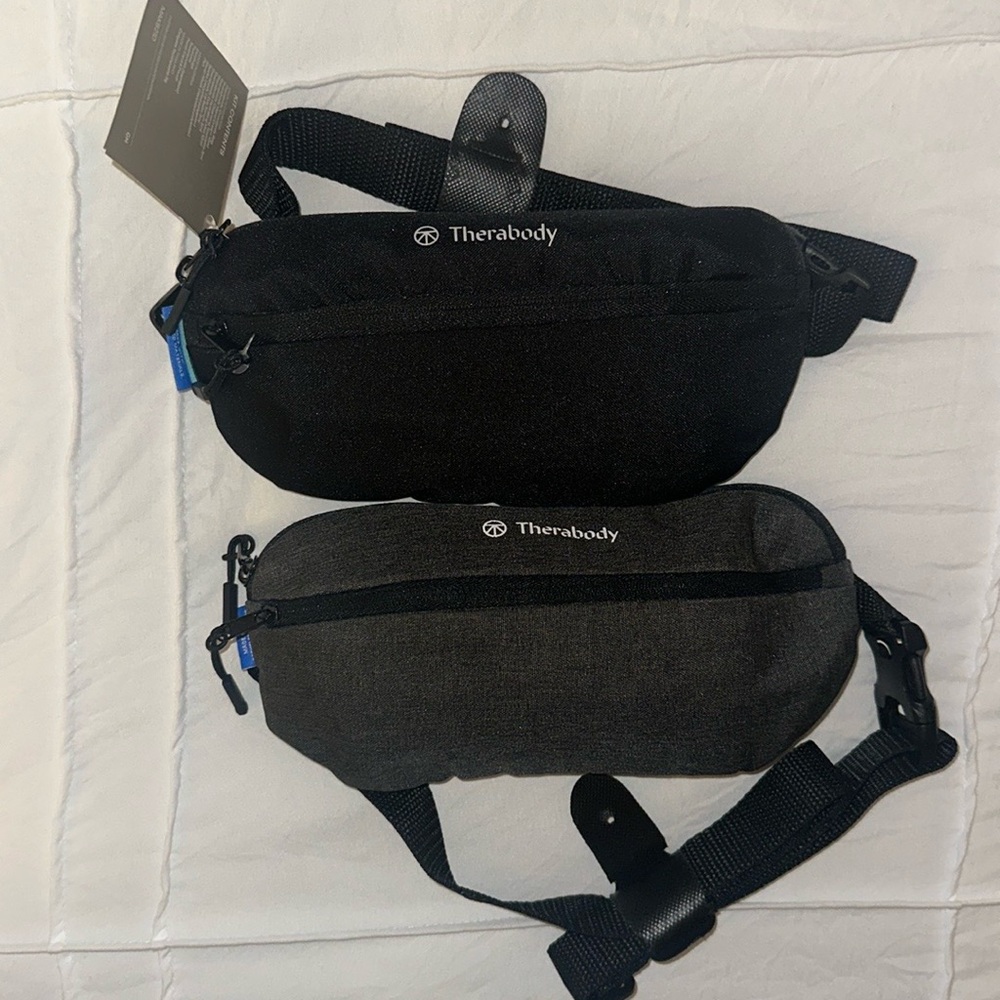 2 Therabody crossbody bags with travel products - one black and one gray - New